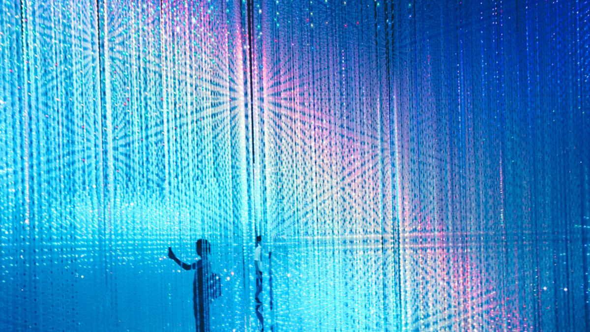 Patrons lose themselves amidst the Crystal World, one of the many exhibits in teamLab permanent exhibition in the Mori Digital Art Museum in Tokyo, Japan on 14 July 2018. (Shutterstock/File)
