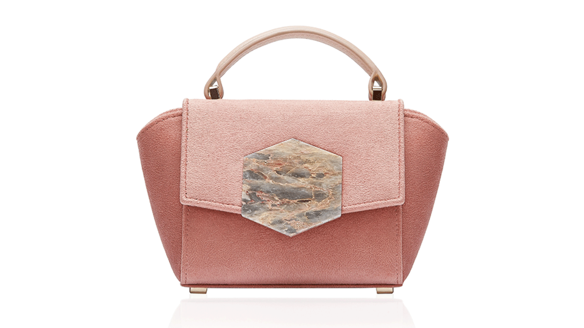 Bakari is a Spanish handbag brand by designer Carmen Lopez with the purpose of protecting handmade production techniques.  Bakari utilizes sustainable materials including upcycled marble and wood from refineries, and upcycled silver.