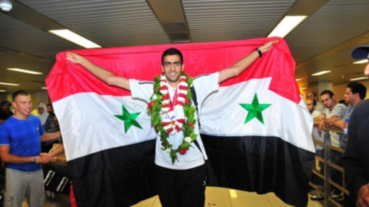 لاعب الوثب العالي السوري مجد غزال: سيرفع صاحب الـ 25 عاماً علم بلاده خلال الأولمبياد علاوةً على آمال شعبه الذي يمر بفترة لا يحسد عليها في ظل الأوضاع الراهنة، ويبدو اللاعب متواضعاً وهادئاً فيما يتعلق بفرصه في مسابقات الوثب العالي.