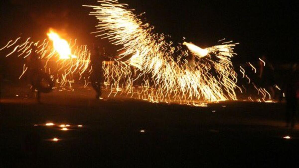 A Palestinian protesters from a group calling themselves the "night confusion units" (Twitter)