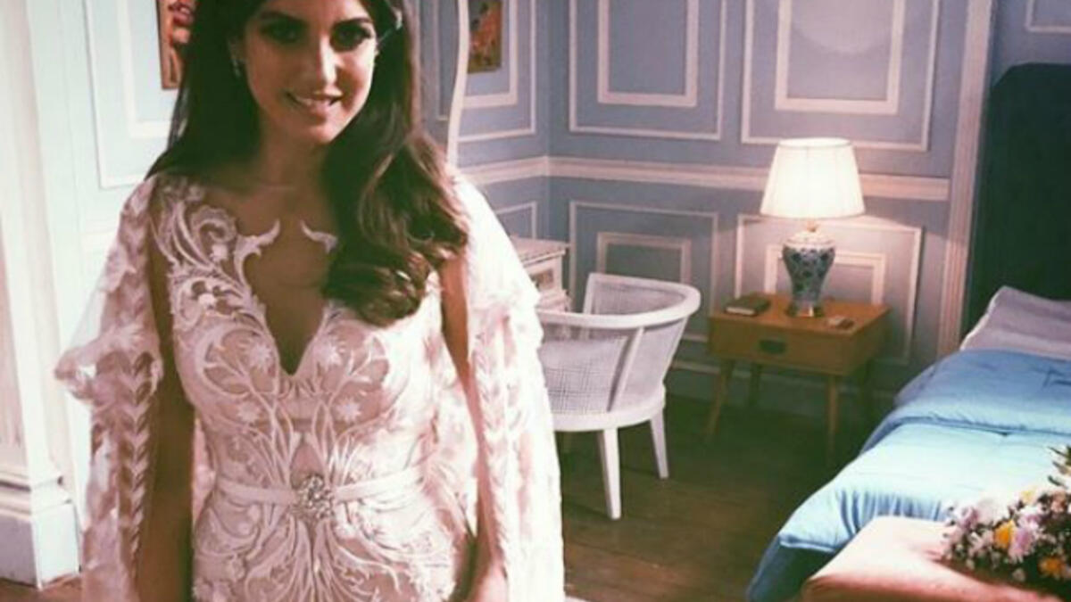 Tunisian beauty Dorra put on a cape dress designed by Egyptian designer Hany Elbehairy in Nasr Al Said Saids Eagle series