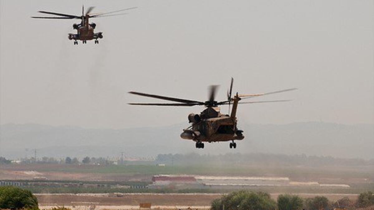 34 people were rescued in a large operation involving four police helicopters and several boats (Twitter)