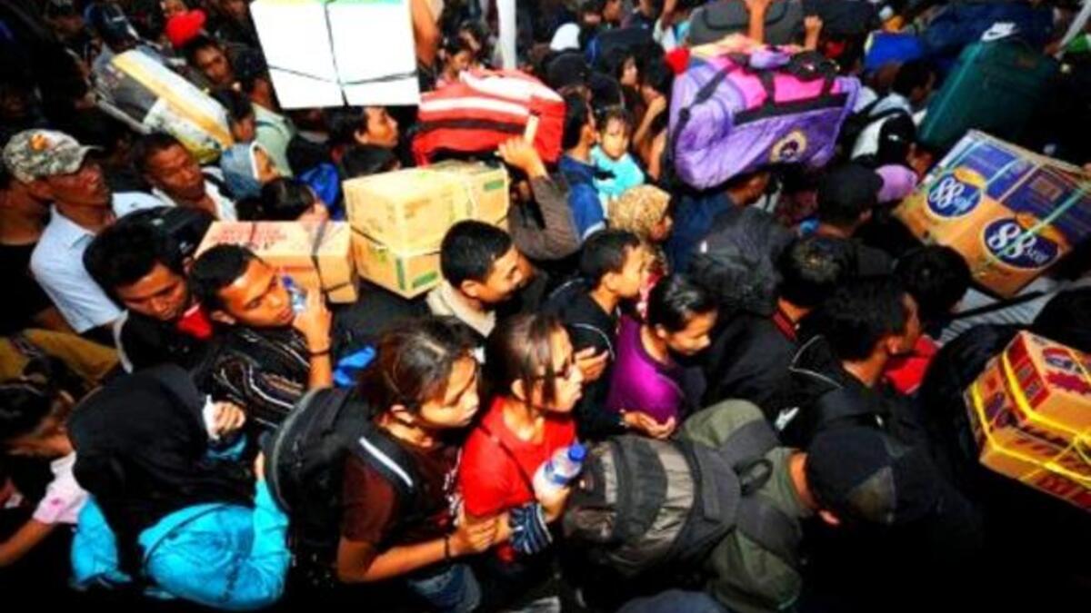 INDONESIA, JAKARTA: Eid preparations include city workers traveling to be with family, making their way home to celebrate Eid.  A  mini migration of Indonesians, seen at this Jakarta train station, heading to their hometowns to celebrate the close of this month of faithful devotion and to enjoy a break from work in the city.