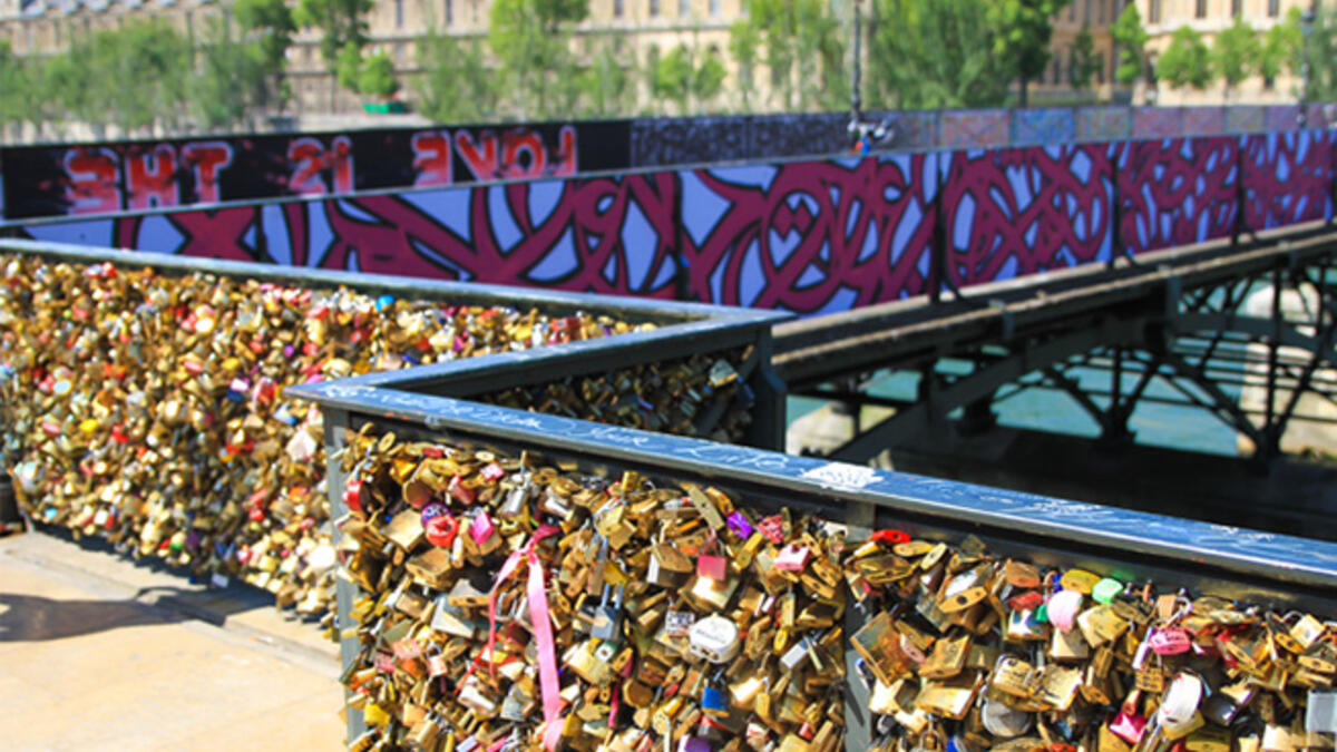 Paris bridge love locks graffiti