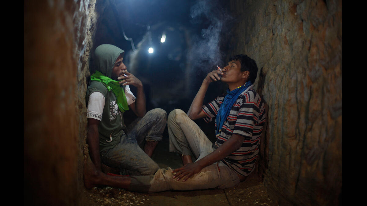 hamas fighters smoking in tunnel