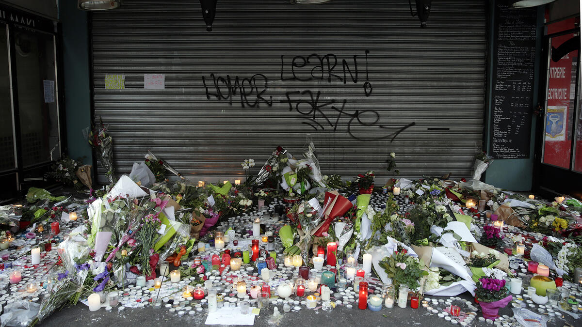 flowers vigil paris attacks