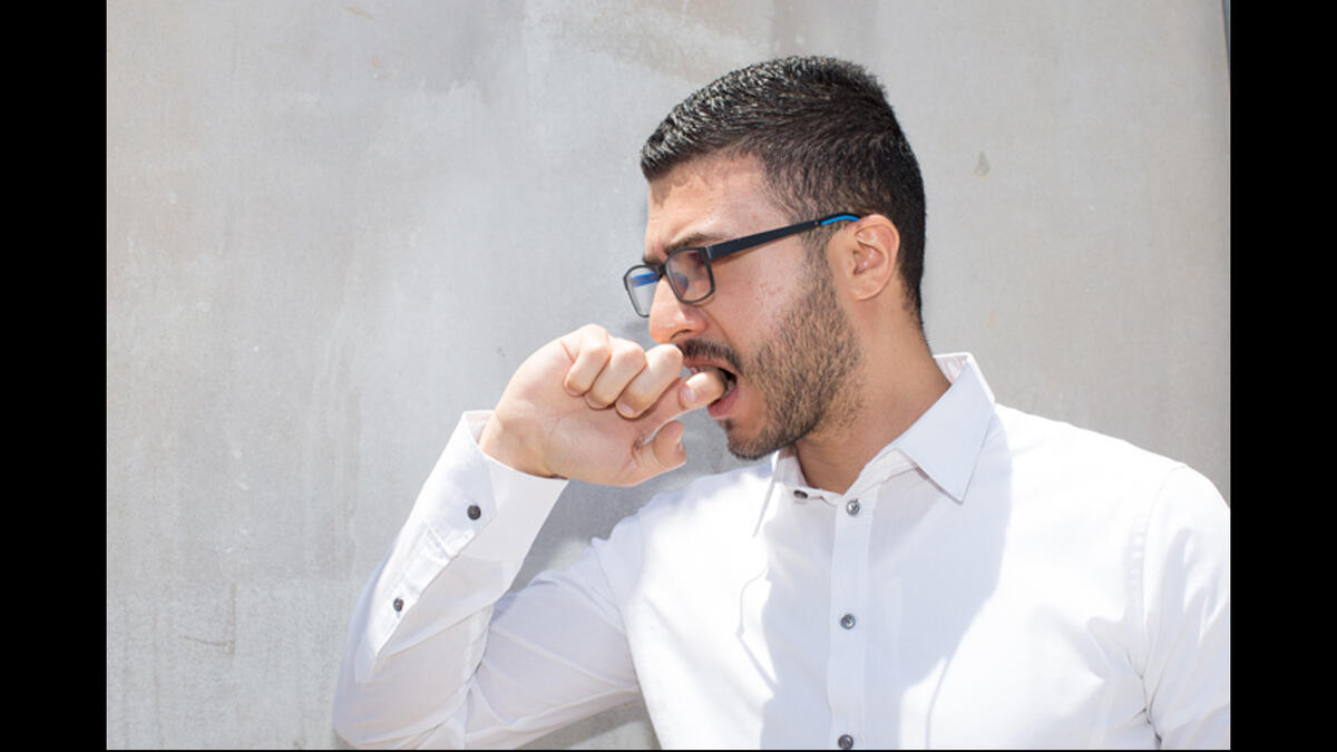 biting hand Arabic sign