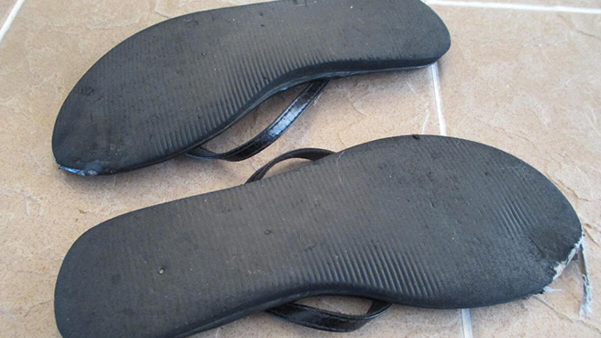 upturned slippers shoes soles facing heavens haram