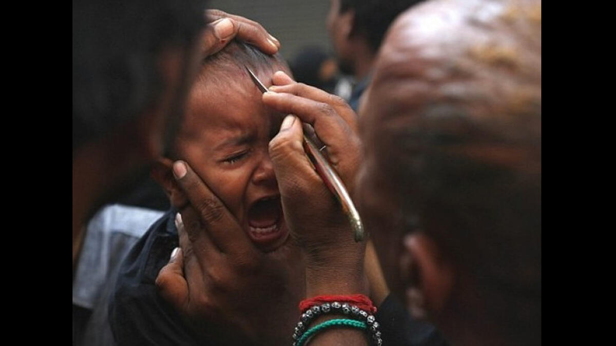 Some parents slice the tender foreheads of their small children, causing profuse bleeding with dramatic symbolism but with little real physical harm (though we can't speak for psychological damage).