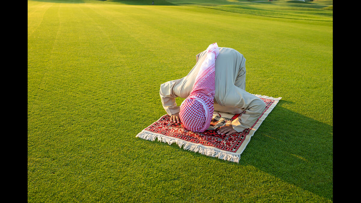 muslim man praying outdoor