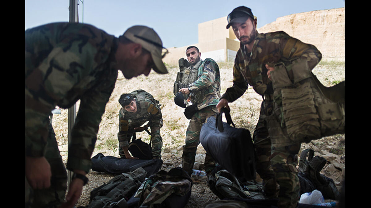 The Lebanese Armed Forces gather their gear before heading to the next event in the Warrior Competition. Different teams from Lebanon competed, including the Black Panthers, part of the Lebanese intelligence service.