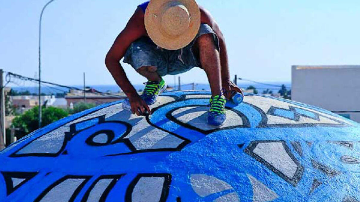 eL Seed graffiti wall Arab artist Djerba