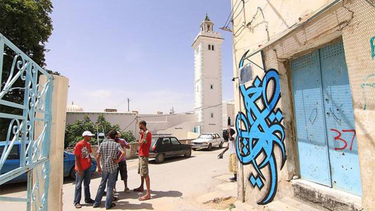 eL Seed graffiti wall Arab artist El Kef