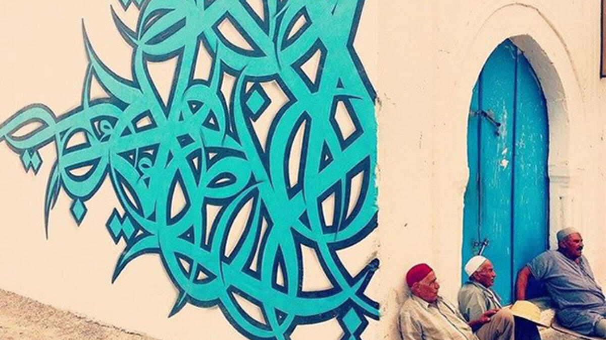 eL Seed graffiti wall Arab artist Djerba