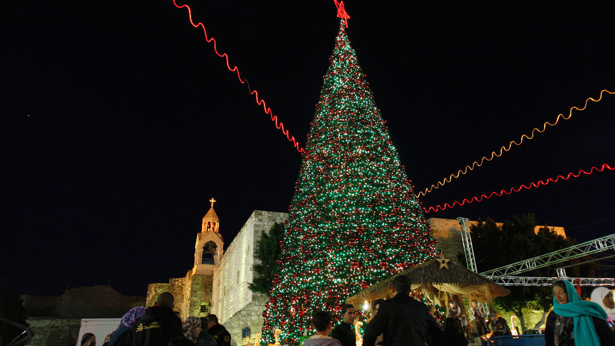 Bethlehem goes all out for Dec. 25. The small city (pop. 25,000) erects a 50-foot Christmas tree in Manger Square, near the Church of the Nativity, where Jesus was born. Holiday cheer gets mixed with a healthy dose of nationalism: the tree is usually lit up with green, red and white lights to match the Palestinian flag.