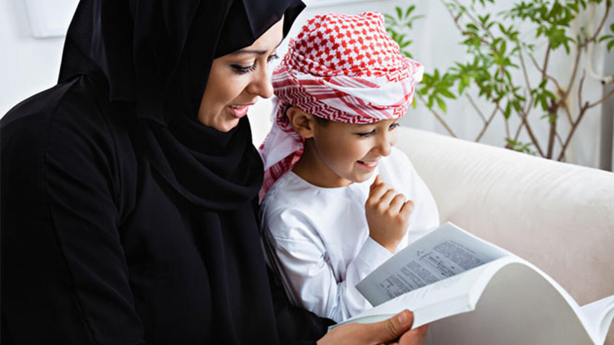 mother child studying Arab