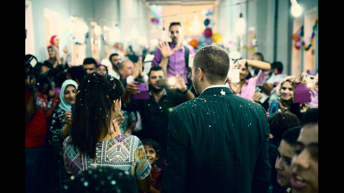 Jordan couple shares wedding with Syrian refugees