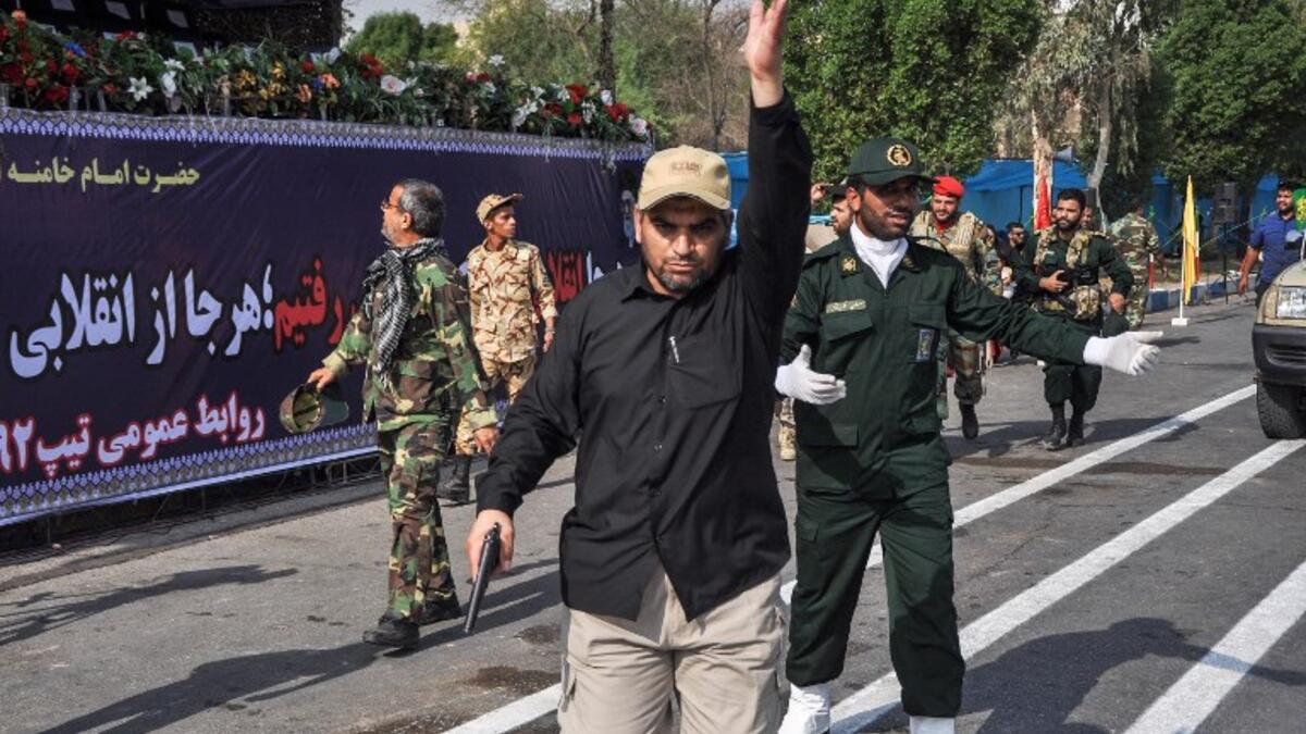 An attack on a military parade that was marking the anniversary of the outbreak of its devastating 1980-1988 war with Saddam Hussein's Iraq. (BEHRAD GHASEMI / ISNA / AFP)
