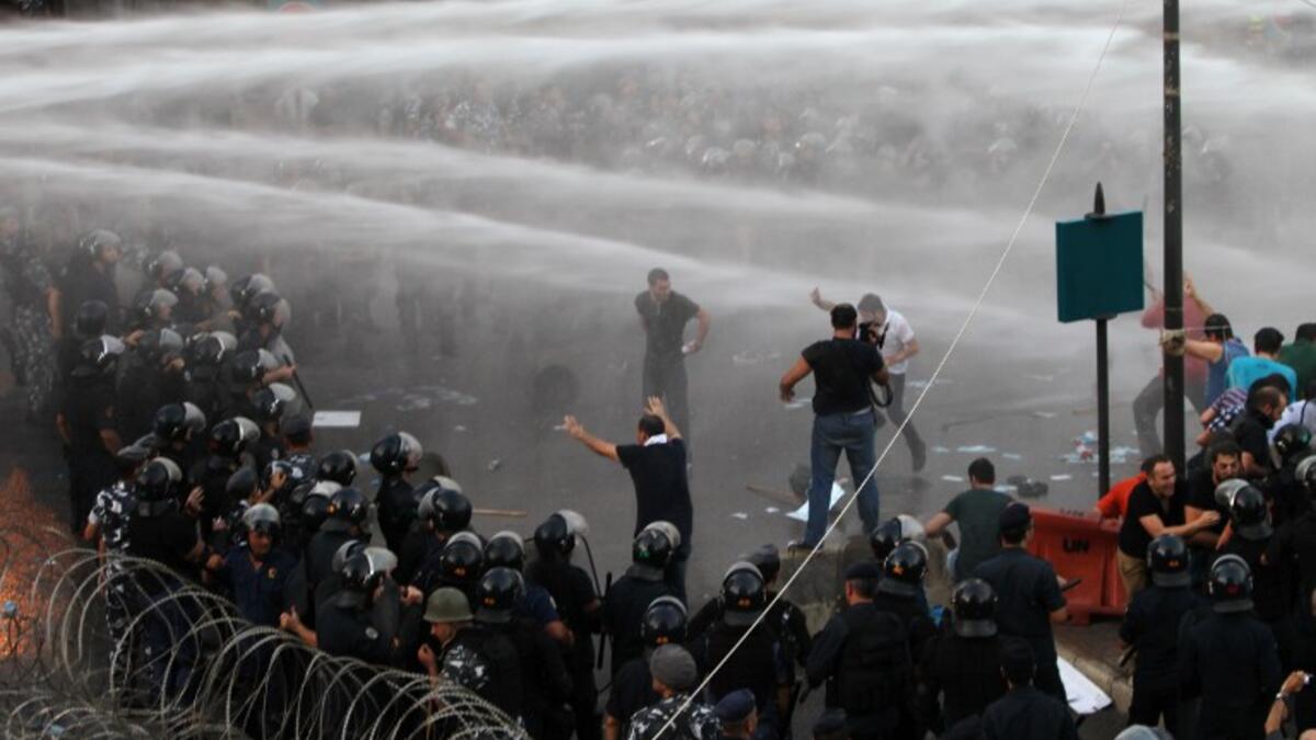 water cannon Lebanese protesters