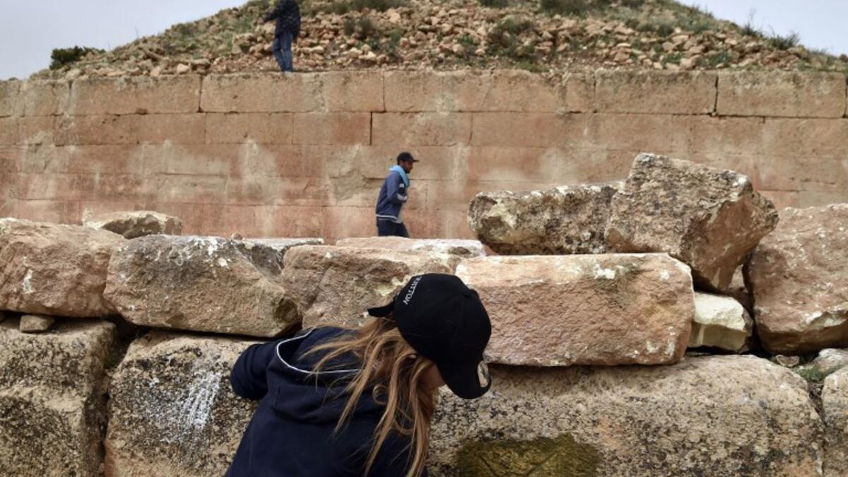Experts and students from Algiers University’s Archaeology Institute work on one of the Jeddars pyramid tombs, near the city of Tiaret.
RYAD KRAMDI / AFP