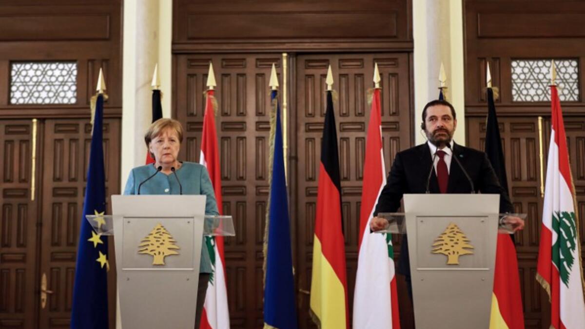 German Chancellor Angela Merkel (L) gives a press conference with Lebanese Prime Minister Saad Hariri at the prime minister's office in the capital Beirut, June 22, 2018 during her official visit to Lebanon. 
(AFP/Anwar Amro)