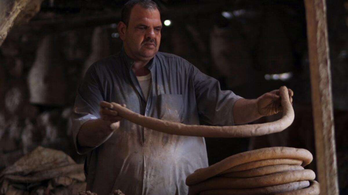 Iraqis making clay pots in Najaf on November 11, 2018. Pottery has deep roots in Iraq, where ancient civilisations turned to clay to build their homes, shape their cooking utensils, and even make their ovens.
Haidar HAMDANI / AFP