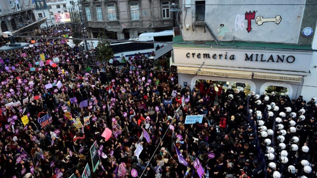 Women's rights activists gather to march through Taksim Square to protest against gender violence in Istanbul, on November 25, 2018, on the International Day for the Elimination of Violence against Women. 
Yasin AKGUL / AFP