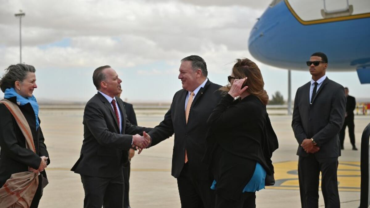 US Secretary of State Mike Pompeo and his wife Susan (2nd R) are welcomed by U.S. Charge d'affaires Jim Barnhart and his wife, Elizabeth Barnhart (L), upon their arrival in Amman at the start of a Middle East tour.
Andrew CABALLERO-REYNOLDS / POOL / AFP