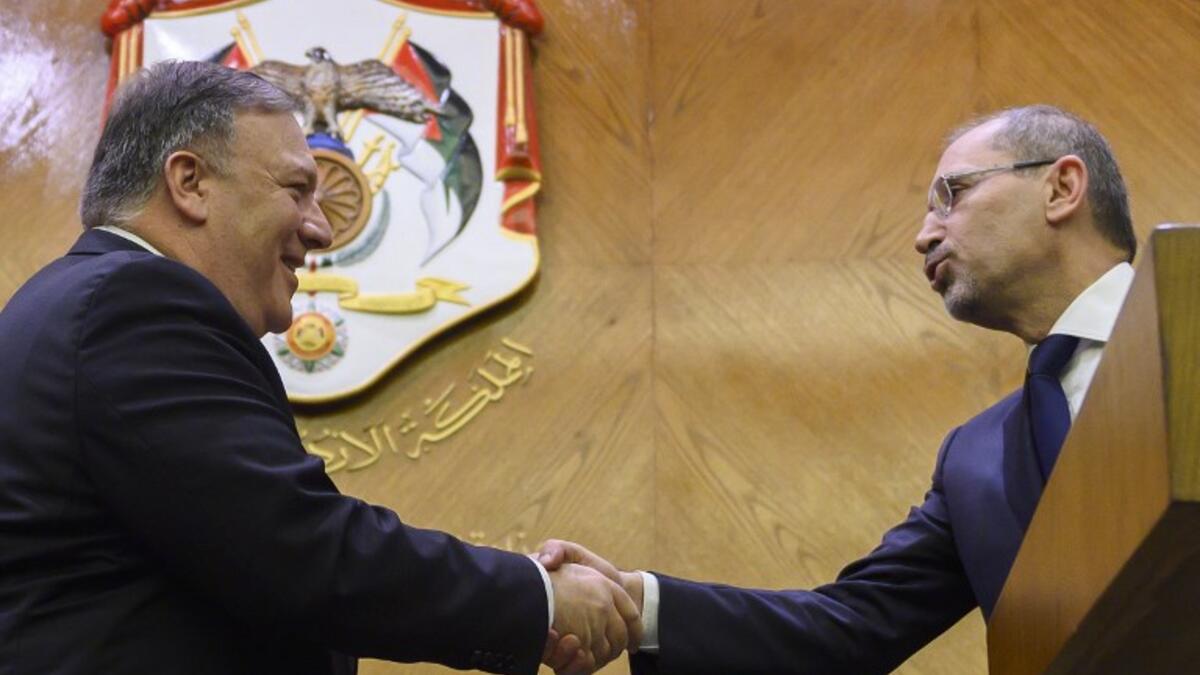 US Secretary of State Mike Pompeo (L) shakes hands with Jordanian Foreign Minister Ayman Safadi (R) in Amman during a press conference at the start of a Middle East tour to show commitment to the region.
ANDREW CABALLERO-REYNOLDS / POOL / AFP