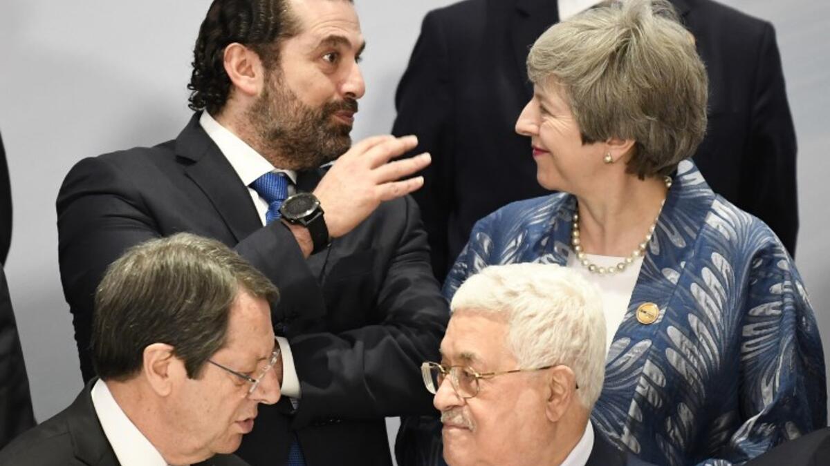 Lebanese Prime Minister Saad Hariri (up-L) speaks with British Prime Minister Theresa May (up-R) above Cyprus President Nicos Anastasiades (down-L) speaking with Palestinian President Mahmud Abbas during the first joint European Union and Arab League summit.
Khaled DESOUKI / AFP