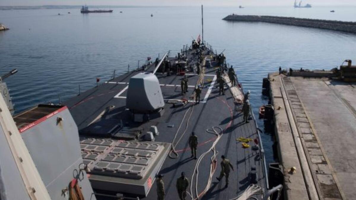 Guided-missile destroyer USS Donald Cook departing Larnaca, Cyprus on Monday (AFP)