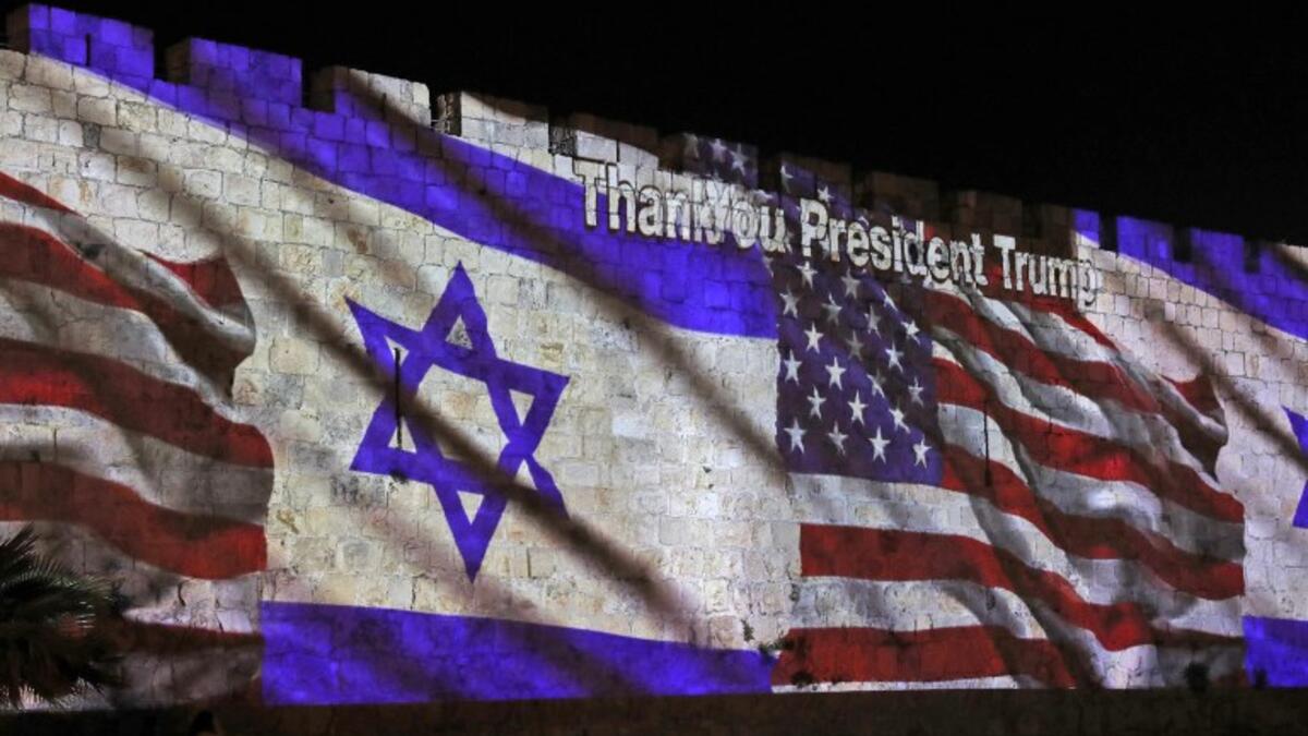 The Israeli and United States flags are projected on the walls of the ramparts of Jerusalem's Old City, to mark the opening of the new US embassy on May 14, 2018. (AFP/ File Photo)