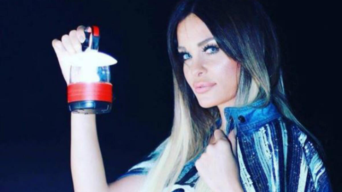 Dominique Horani posted a picture of her self with a lantern as a Ramadan greeting to her followers (Source: dominiquehourani - Instagram)