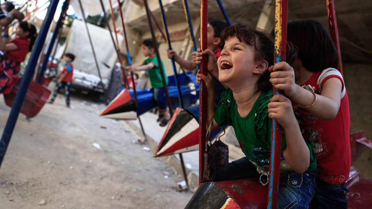 Believing in positive change, a resident of Douma, Abu Ali al Bitar, started to transform former missiles into swings. "I took something that used to kill and turned it into a toy that makes children smile. If children ask me what all the noise and smoke is I always say 'don't panic, it's just Allah giving you something new to play with."
