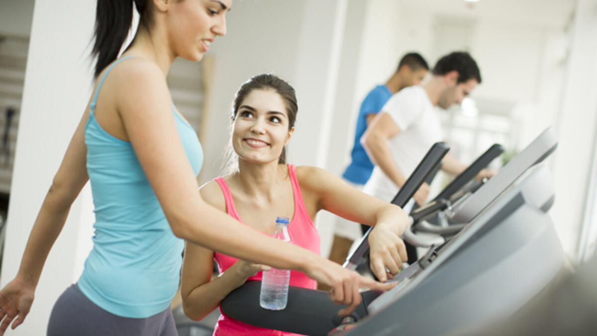 women working out treadmill