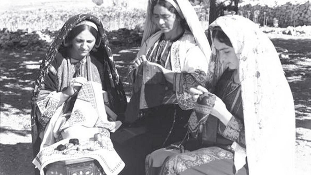 Ramallah, 1939-45. Traditionally, women used to gather to work on their embroidery projects, an occasion during which stories were not only told but became woven into the women’s embroideries. (Palestyle)
