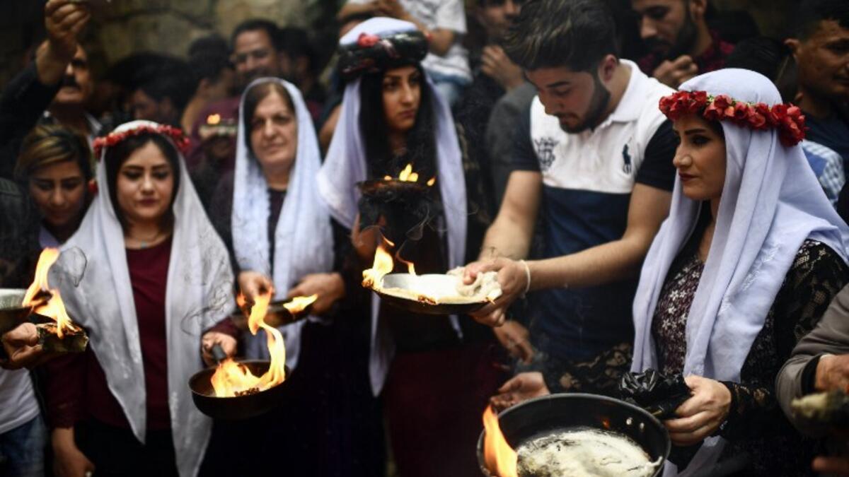 The Yazidi new year is welcomed with candles and lamps in the Lalish Vallley, Iraq. The celebrations announce the birth of spring and a new cycle of life, commemorating the creation of the universe and honoring nature.