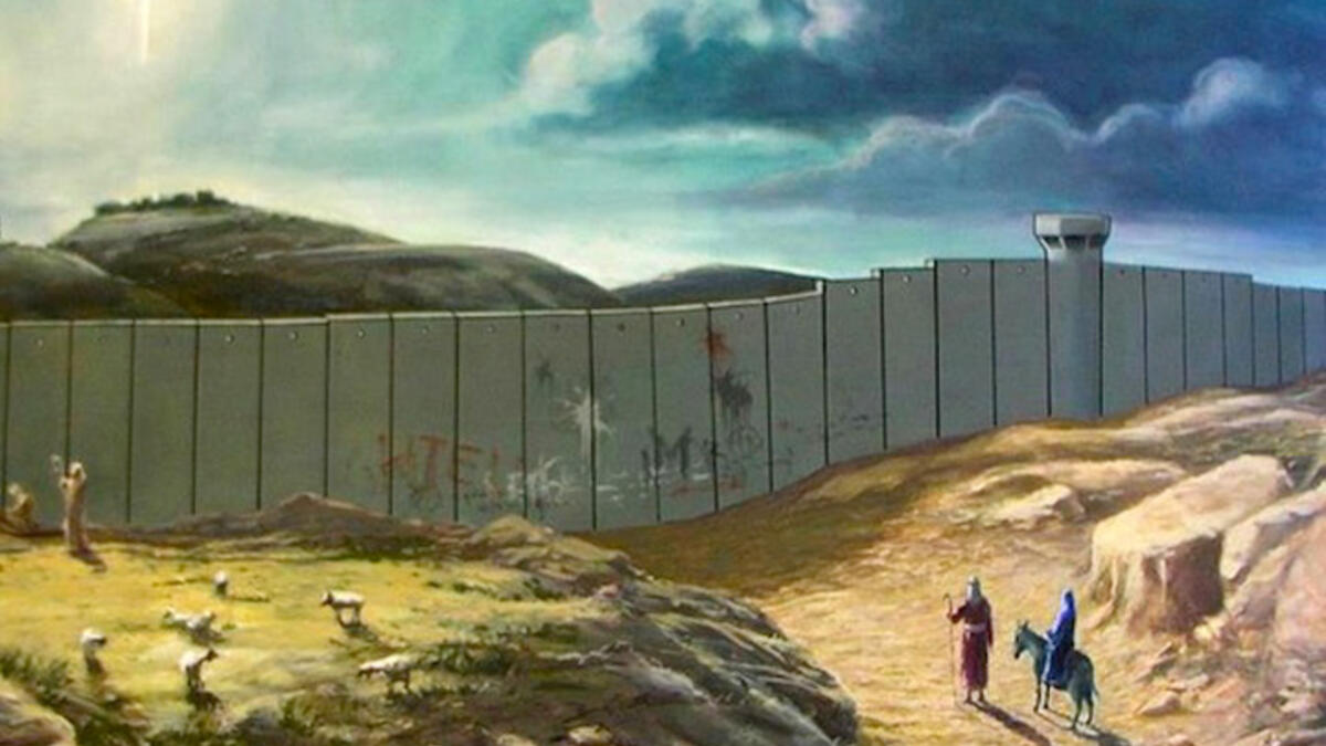 This politically-charged image made the rounds two years ago featuring what appears to be the New Testament's Joseph and Mary blocked from reaching Bethlehem (the Palestinian city purported to be the site of Jesus' birth) by the Israeli West Bank barrier. It’s attributed to the artist, and known as “Banksy’s Christmas card”.