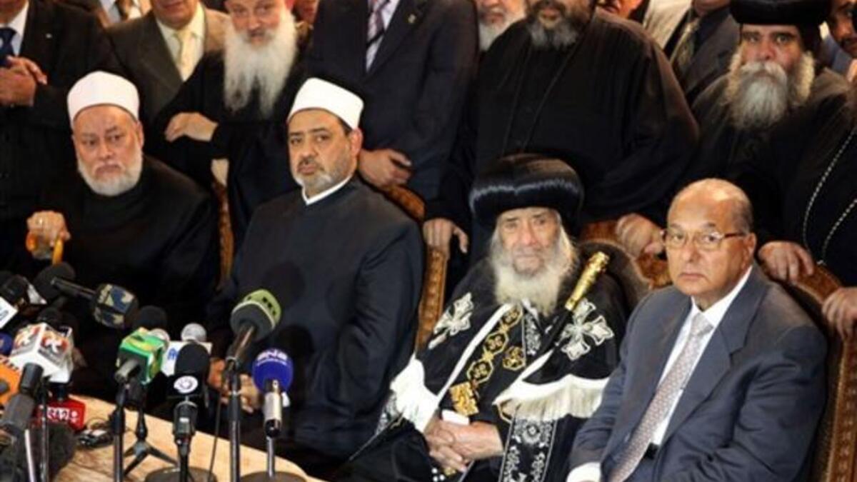 Pope Shenouda III of Alexandria, Egyptian Grand Imam of Al-Azhar Ahmed al-Tayeb, Egyptian Mufti Ali Gomaa and Egypt’s Minister of Awqaf (religious endowments) Mahmud Hamdi Zaqzuq hold a joint press conference at the al-Abasseya Cathedral.