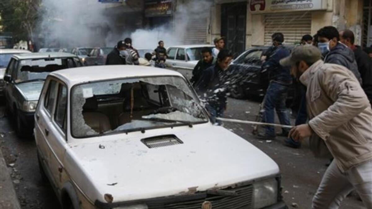 Egyptian Christian youths go on the rampage in the area of the Al-Qiddissine church.