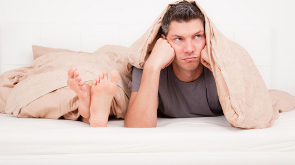 man and woman bed sheets