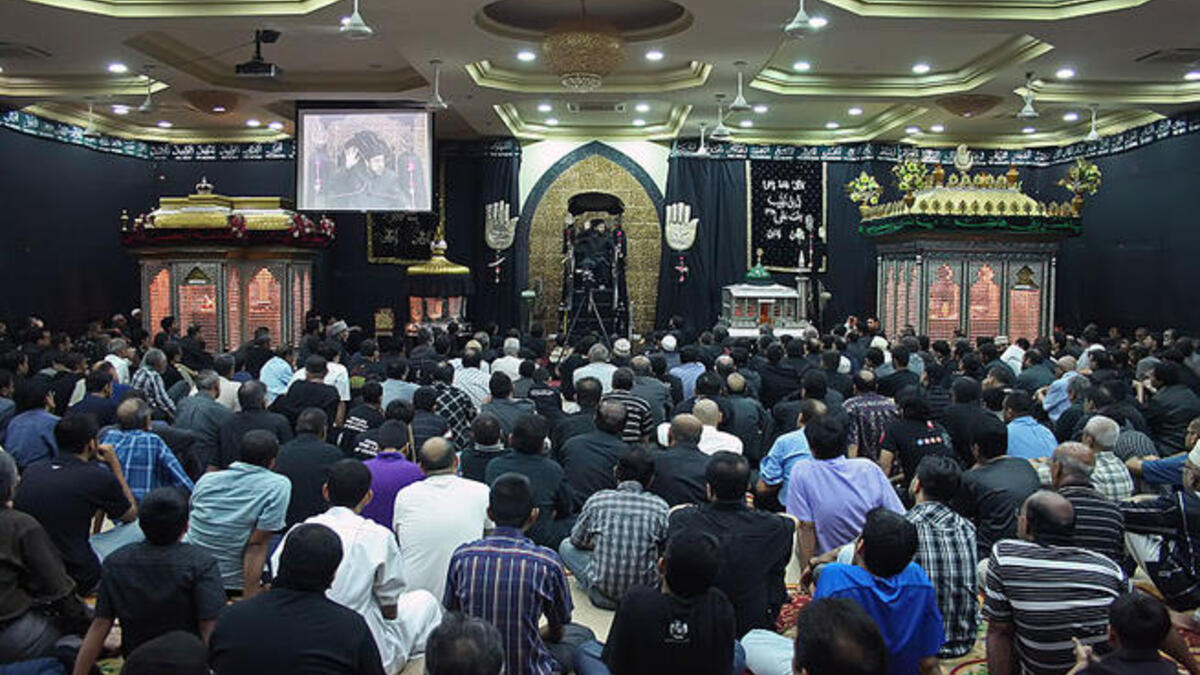 Ashura, aside from the general sombre tone to the day, is actively made up of mourning rituals and passion plays re-enacting
the historical martyrdom and suffering. While centered in the more widely recognized, high profile outdoor parades, there is also
activity in indoor congregation halls known as Hussainia (pictured).