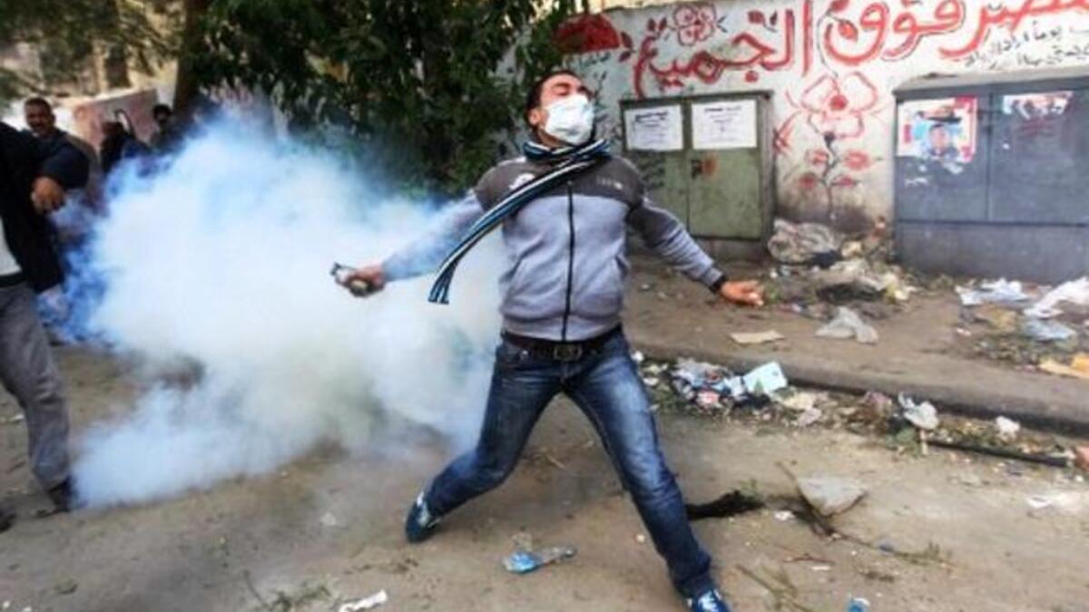 Coming up for freedom & air: The protesting people are met with harmful gases. Egyptian police under SCAF 
command have been using excessive force against anti-government crowds. 'Teargas' is being used in no short supply in 
Tahrir:  Potent gases, suspected to be nerve gas or cyanide gas, are causing hundreds of protesters to faint or worse.