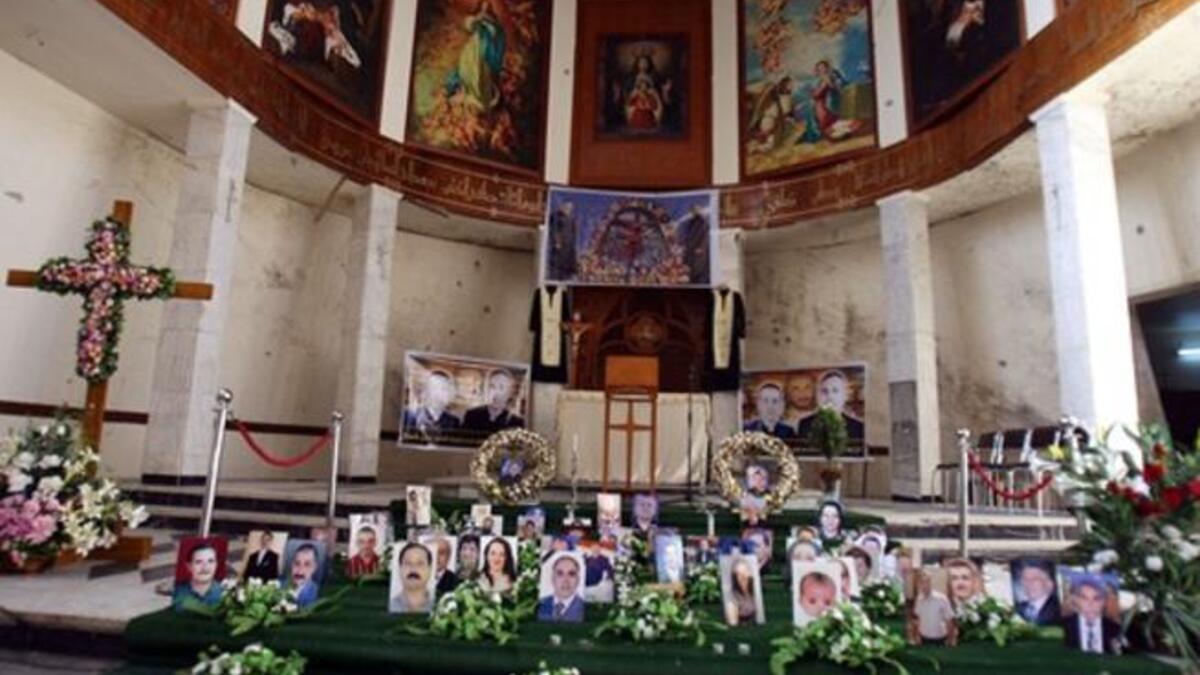 A shrine for Iraqi Christians who were killed in Al-Qaeda siege is erected at Sayidat alNejat Church in Baghdad  as Christmas for Iraqi Christian community will this year be a time of fear and cancelled celebrations instead of rejoicing following renewed threats by Al-Qaeda and the church massacre.
