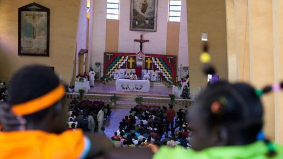 South Sudanese attend a Christmas service at the Juba Catholic cathedral, in the southern Sudan's capital city, in what may be their last Christmas in a unified Sudan.