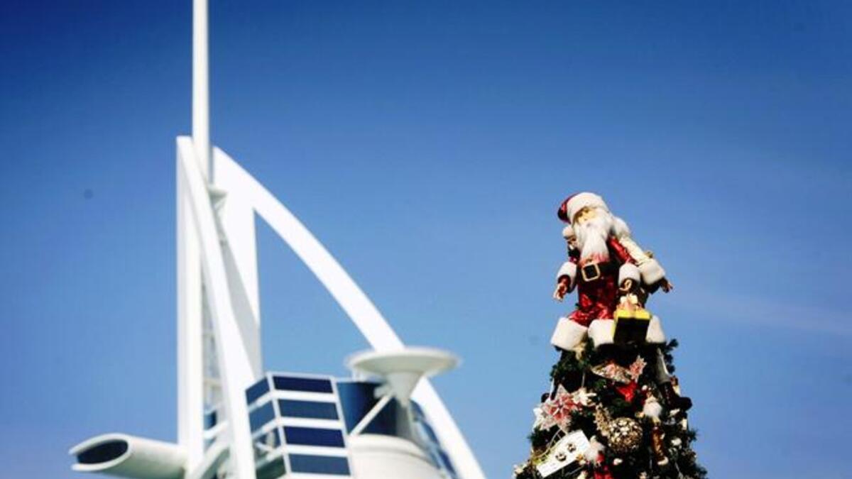 Dubai does it biggest and brightest! While not yet a public holiday in the UAE, you'd be forgiven for thinking you were in a festive Christmas conforming country if the malls were anything to go by. Here a tree placed to stand proud near the soaring Burj al Arab.
