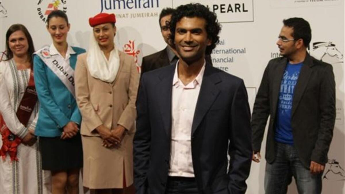 Actor Sendhil Ramamurthy arrives to attend the Cairo Exit film premiere.