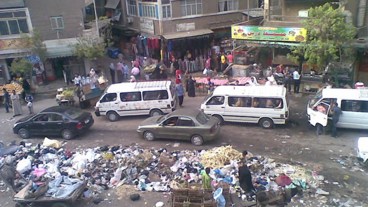 Dirty Egypt: Egypt today is crowded with very high population densities. Cairo, specifically,
is renowned for its pollution & grime, in stark contrast to the Egypt of the pre-Coup era with its roominess, clean feel
 & liberal character. The notoriously decrepit taxi cabs replace the fancy cars.