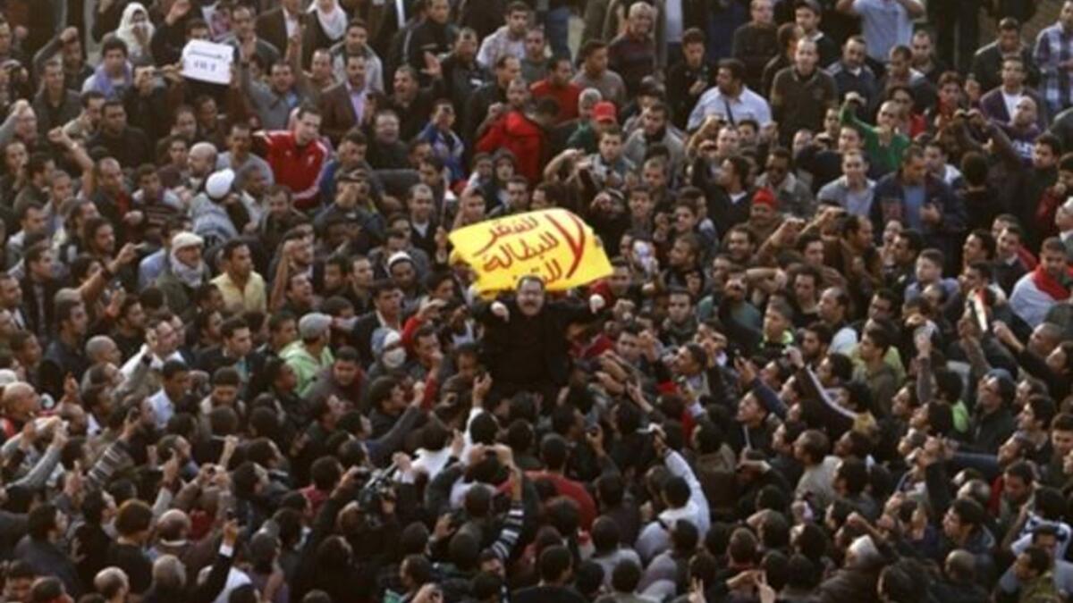 Thousands of demonstrators took to the streets of Cairo, facing a massive police presence, to demand the ouster of President Hosni Mubarak in a protest.