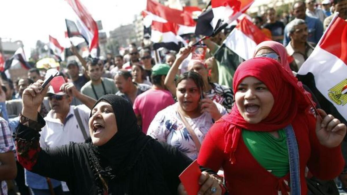 Reports of sexual harassment didn't stop these women from making their voices heard in Cairo (AFP)